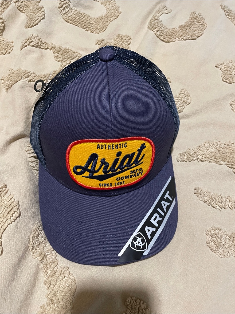 Ariat Navy Trucker Hat with Gold and Red Patch